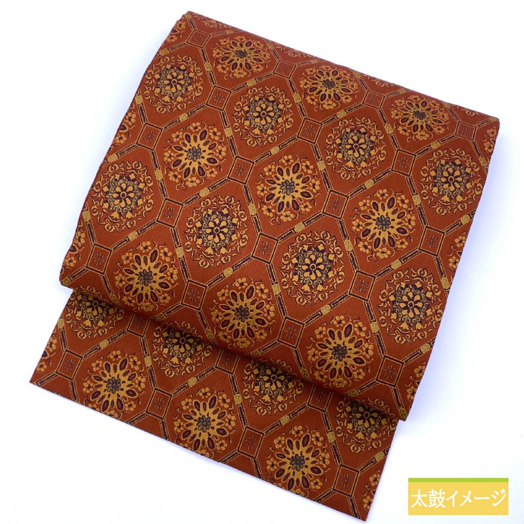 名古屋帯 猩々茶色(しょうじょうちゃいろ) 亀甲 華文 帯丈362cm 正絹 Sランク 全通 カジュアル 橙系 1124007272326 名古屋仕立て