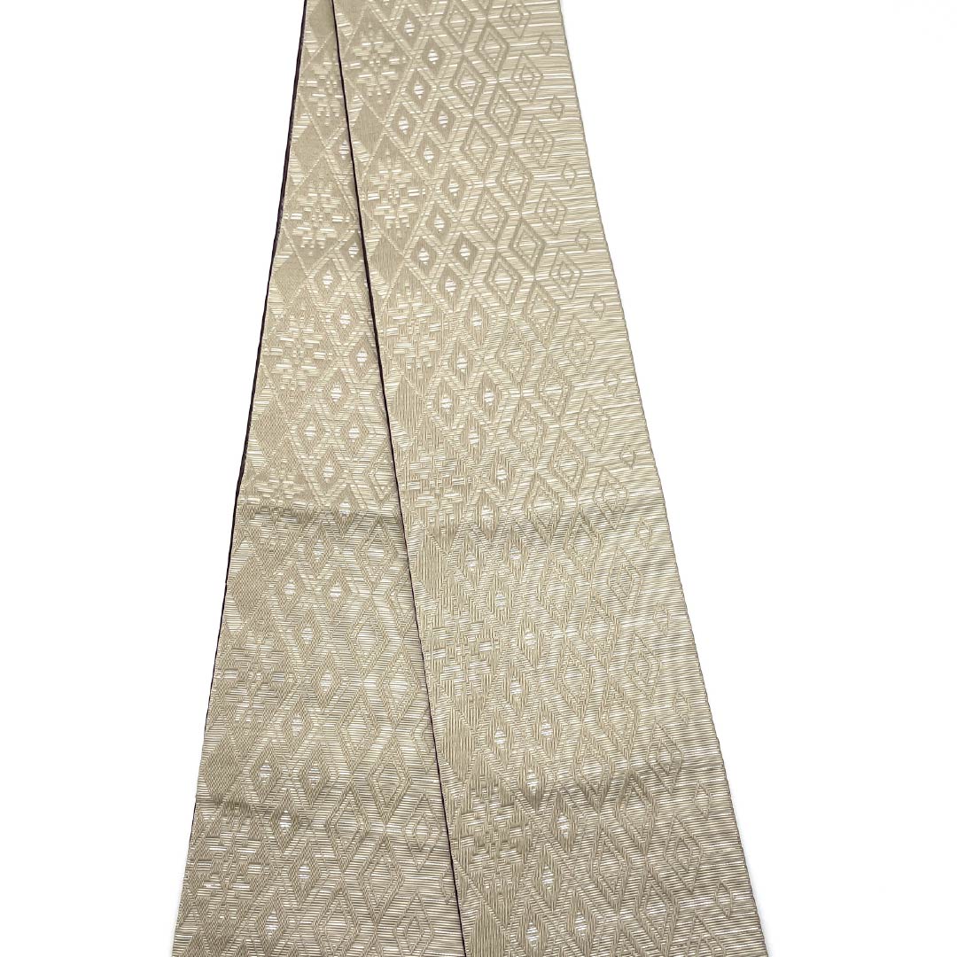 (新品)半幅帯 ポリエステル NEWランク 古晒色(ふるざれいろ) 紫鳶色(むらさきとびいろ) 菱型 抽象花模様 リバーシブル 帯丈400cm ベージュ系 1125002801425