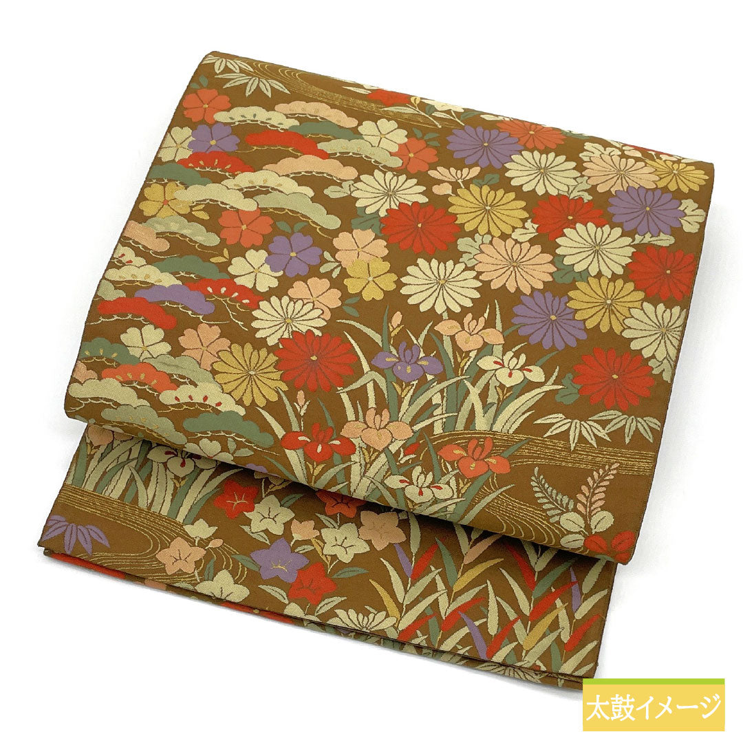 袋帯 正絹 Aランク 紹巴織 流水 草花模様 帯丈432cm 六通 セミフォーマル 茶系 1123016743314