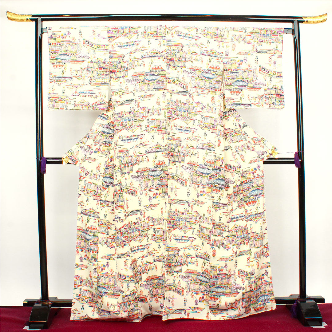 小紋 身丈167cm 裄丈66cm 袷 仕付け糸付き 未使用品 練色 型染 時代人物風景模様 正絹 Sランク クリーム系 1115003032515