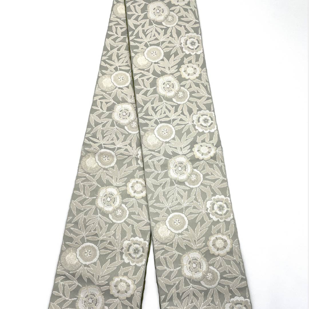 (新品)半幅帯 ポリエステル NEWランク 白練色(しろねりいろ) 梅幸茶色(ばいこうちゃいろ) 抽象花模様 横段 リバーシブル 帯丈400cm グレー系 1125002721422