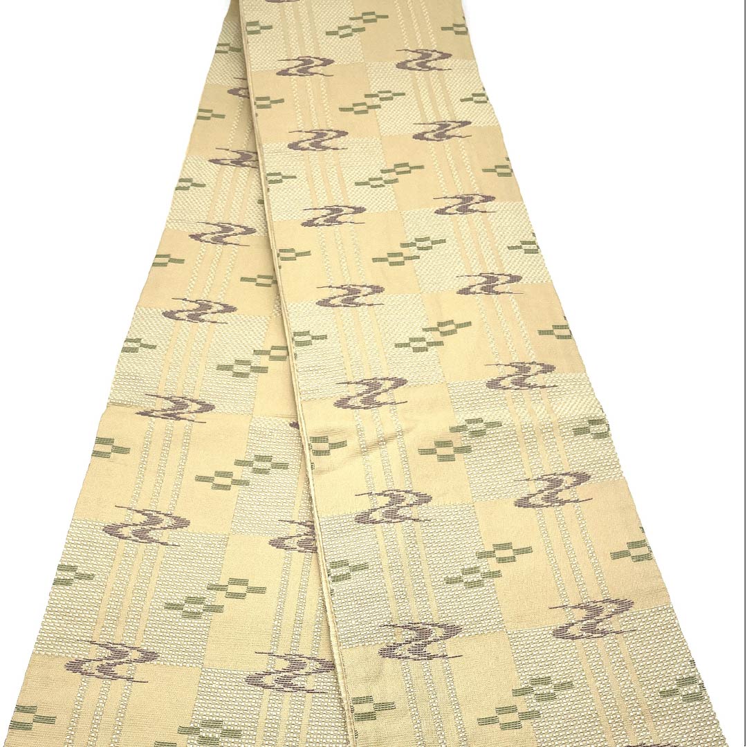 (未仕立)半幅帯 ポリエステル 鳥の子色(とりのこいろ) 絣模様 帯丈386cm ベージュ系 Aランク 1125001693325