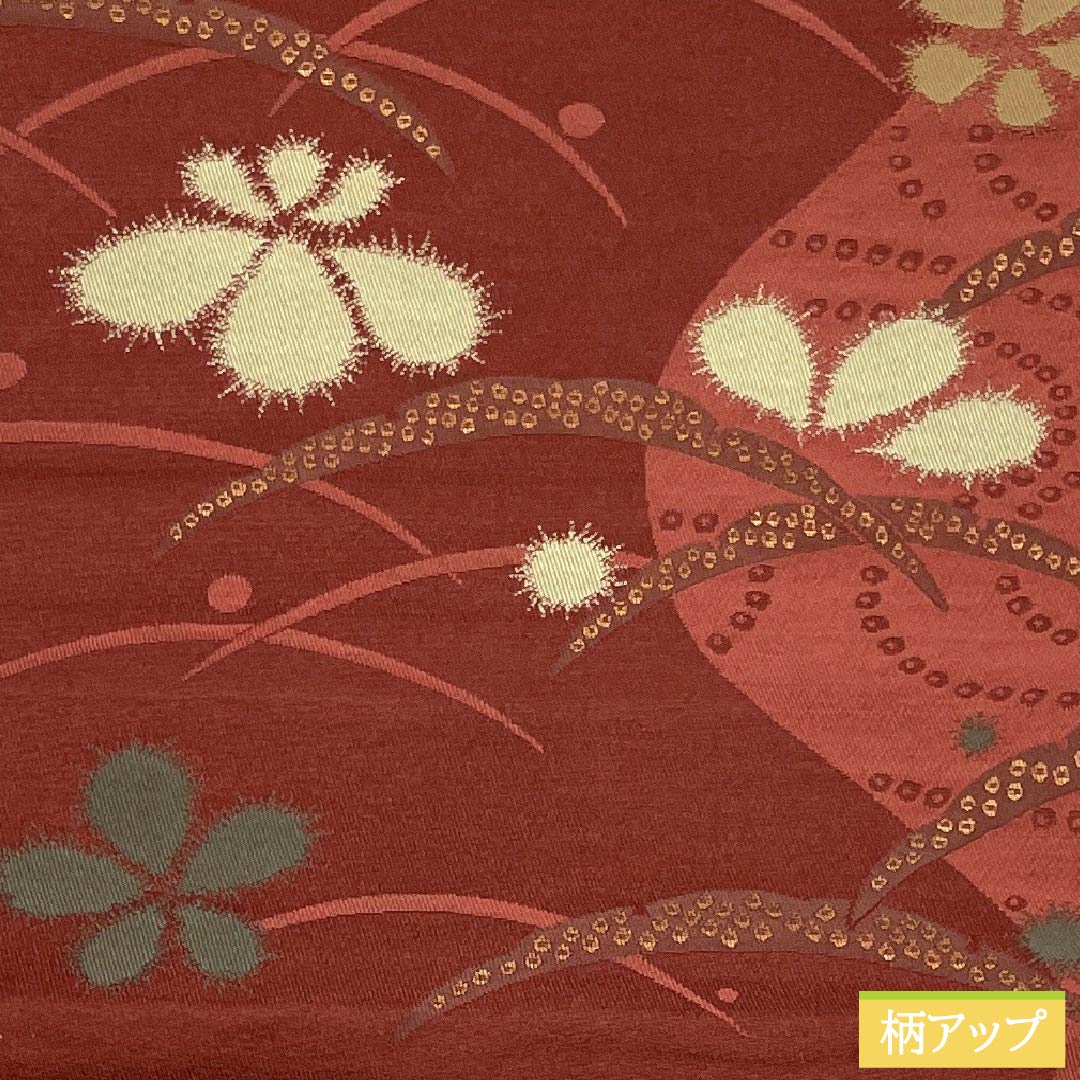 (京袋帯)名古屋帯 ポリエステル Aランク 赤銅色(しゃくどういろ) 京袋帯 露芝 花模様 帯丈364cm 六通 カジュアル 朱系 1124010653316 開き仕立て