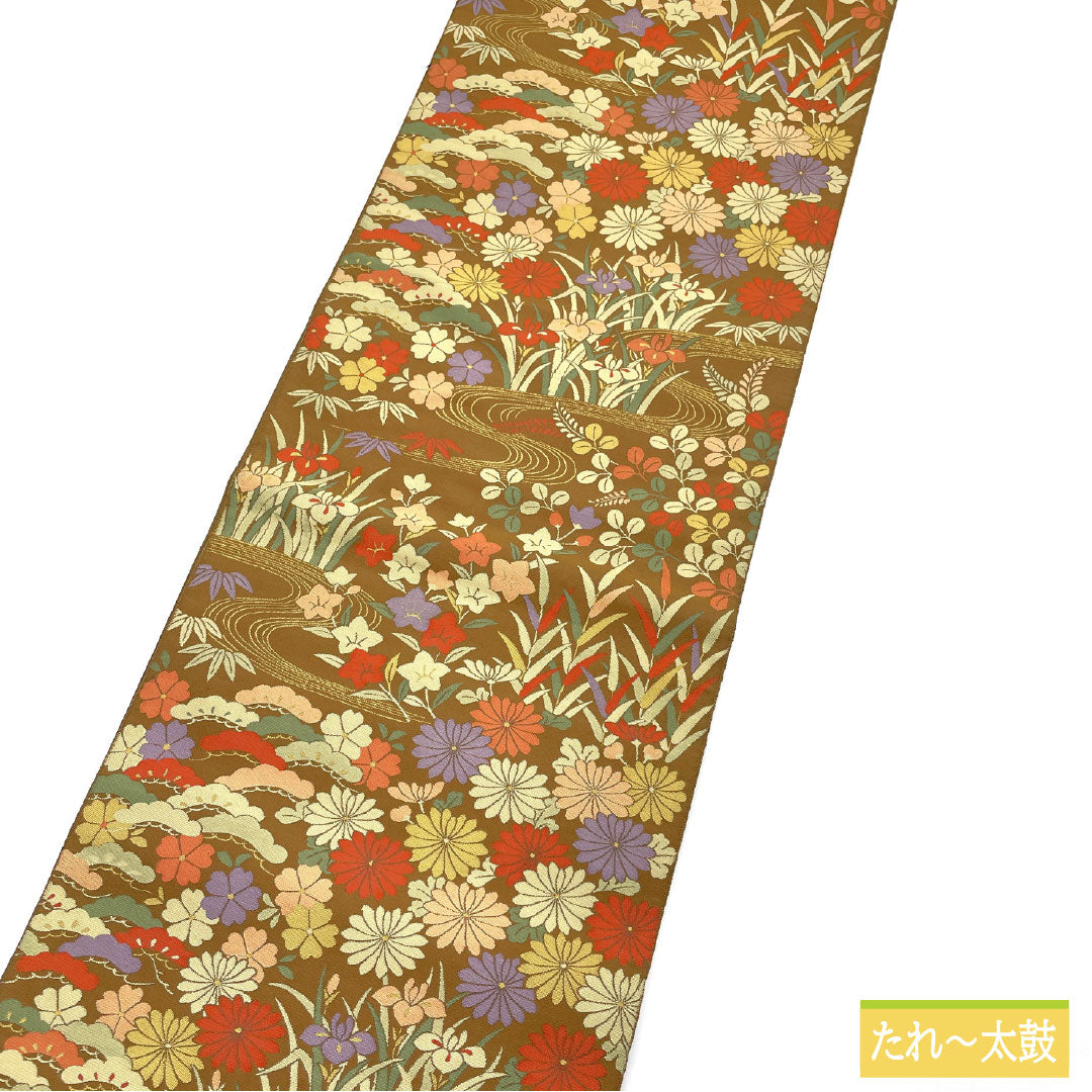 袋帯 正絹 Aランク 紹巴織 流水 草花模様 帯丈432cm 六通 セミフォーマル 茶系 1123016743314