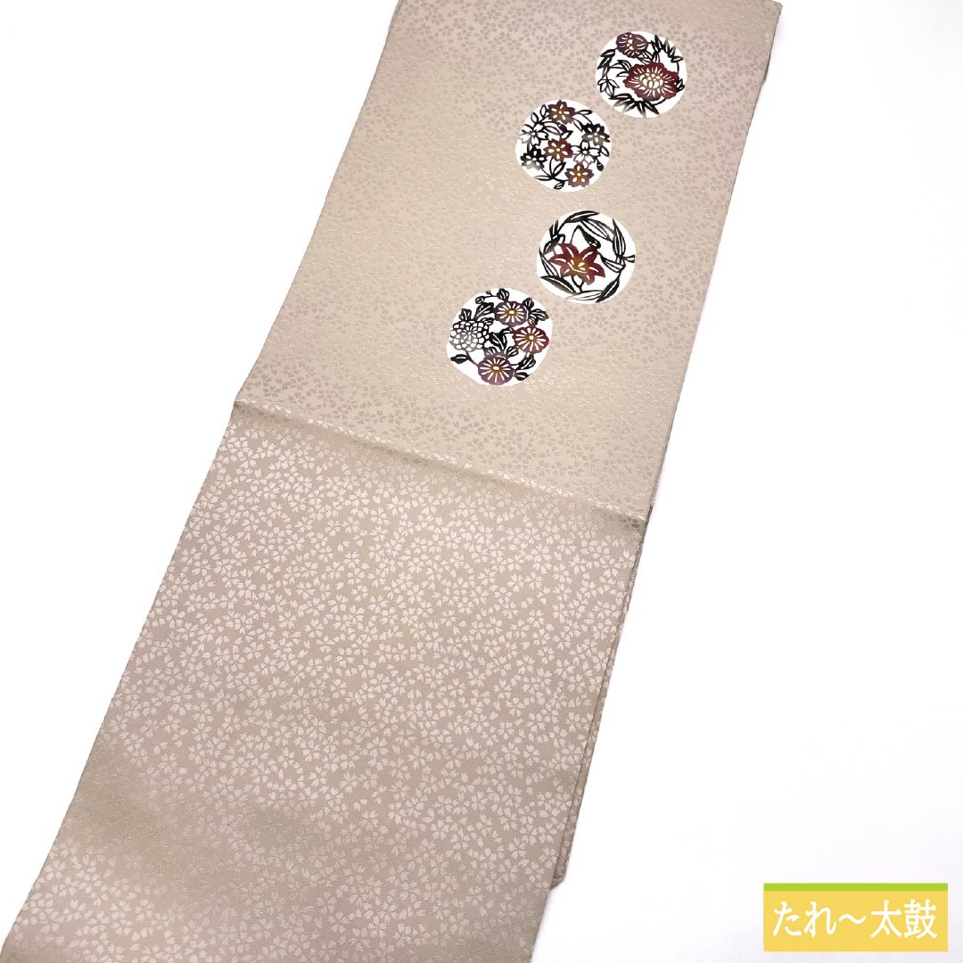 名古屋帯 正絹 Sランク 名古屋仕立て 鴇色鼠色(ときいろねずいろ) 型染 丸に花柄 染め帯 帯丈366cm ポイント柄 カジュアル ベージュ系 1124014232325