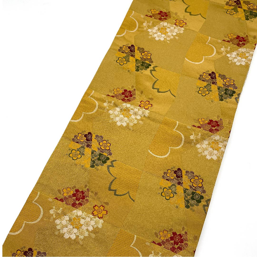 名古屋帯 京袋帯 梅谷渋色 桜 梅 変わり市松 帯丈392cm ポリ Aランク 全通 セミフォーマル 黄系 1124003353323 開き仕立て