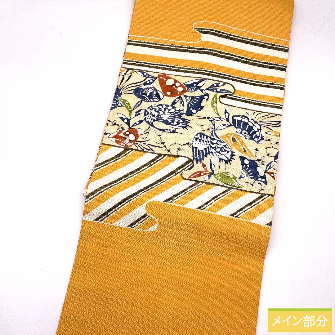名古屋帯 忘れ草色 型染 鶴 紬地 帯丈362cm 正絹 Sランク ポイント柄 カジュアル 橙系 1124005482326 名古屋仕立て