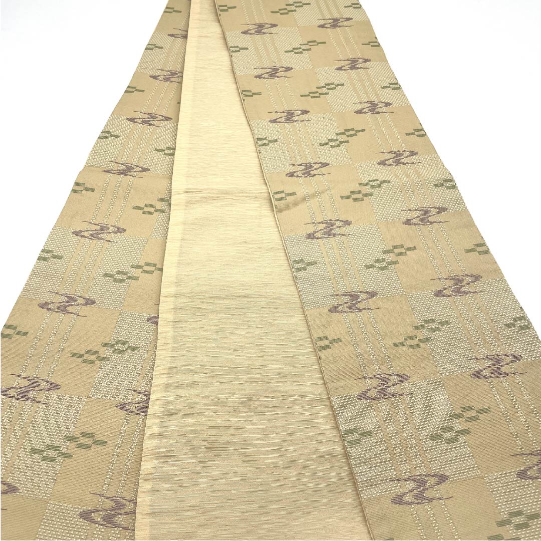 (未仕立)半幅帯 ポリエステル 鳥の子色(とりのこいろ) 絣模様 帯丈386cm ベージュ系 Aランク 1125001693325