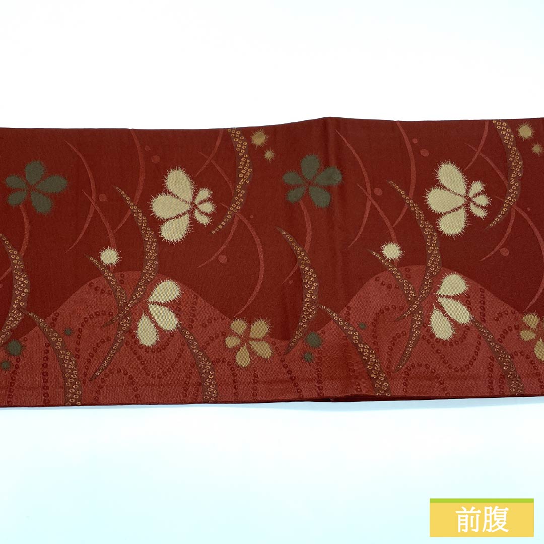 (京袋帯)名古屋帯 ポリエステル Aランク 赤銅色(しゃくどういろ) 京袋帯 露芝 花模様 帯丈364cm 六通 カジュアル 朱系 1124010653316 開き仕立て