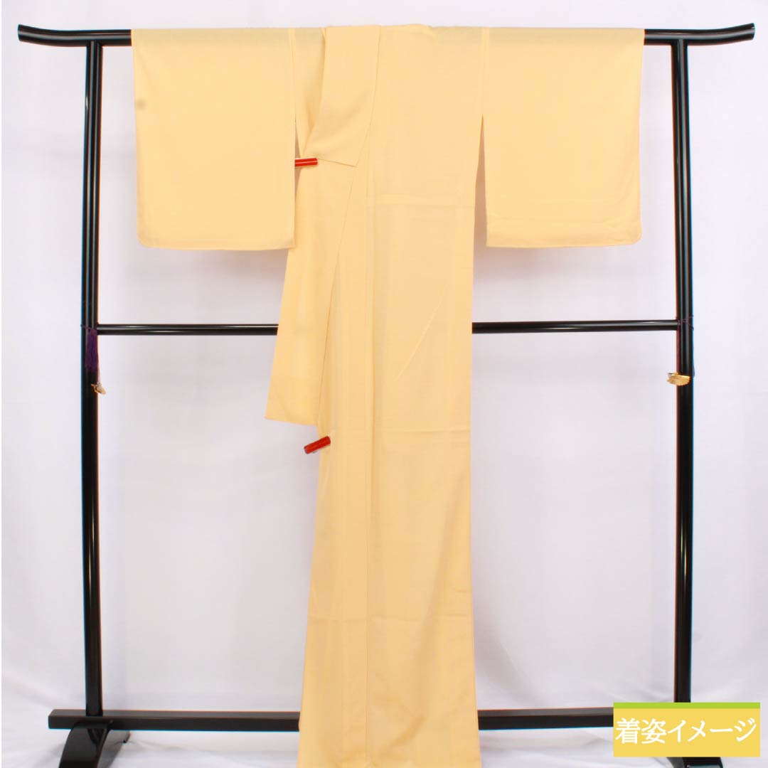 夏物 ポリエステル 色無地 Sランク 身丈171.5cm 裄丈70.5cm 薄柑子色(うすこうじいろ) 一つ紋 五三桐 絽ちりめん 絽 橙系 1132003062626