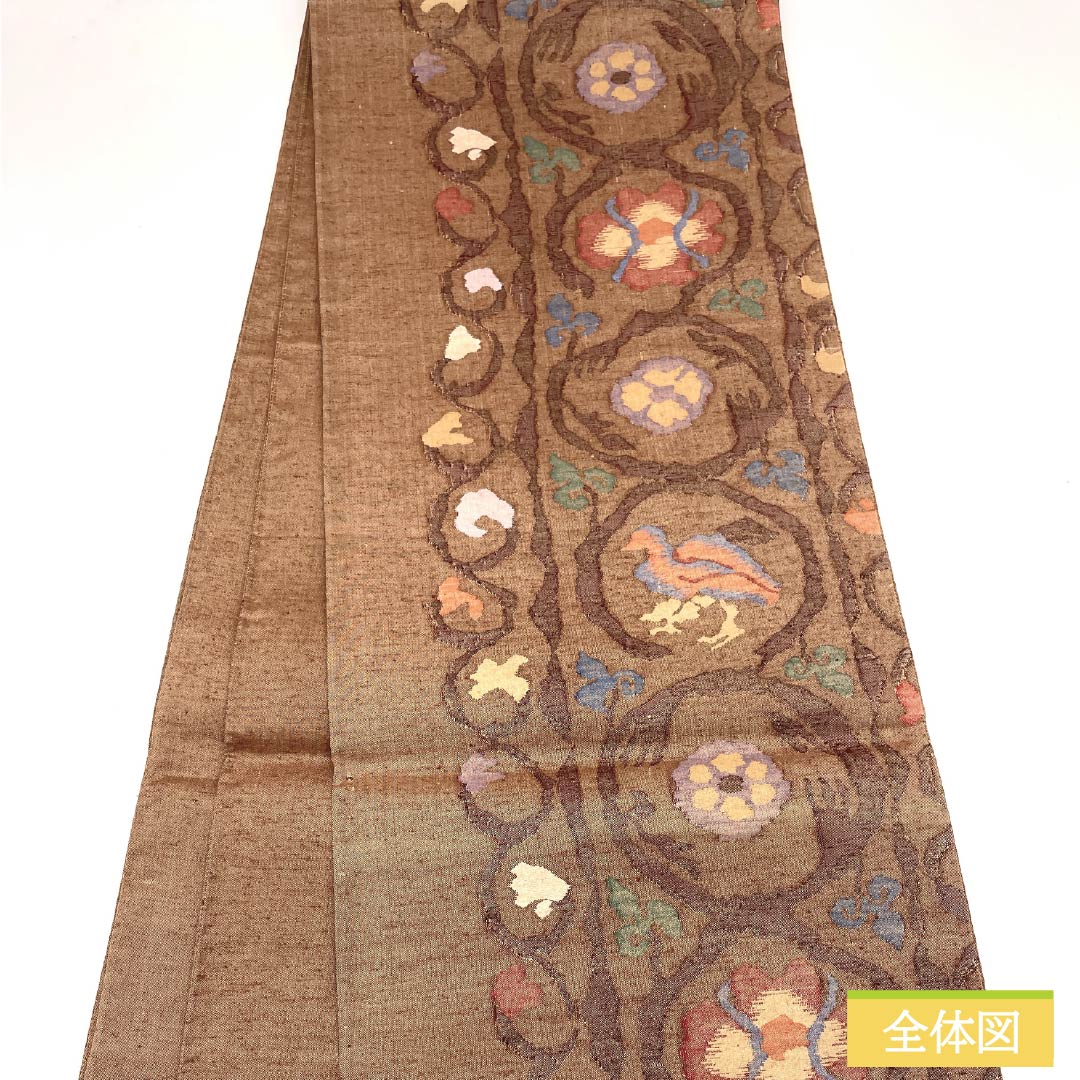 袋帯 正絹 朱度生壁色(しゅどなまかべいろ) 紬地 鳥 丸に花唐草 帯丈444cm Sランク 六通 カジュアル 茶系 1123013192314