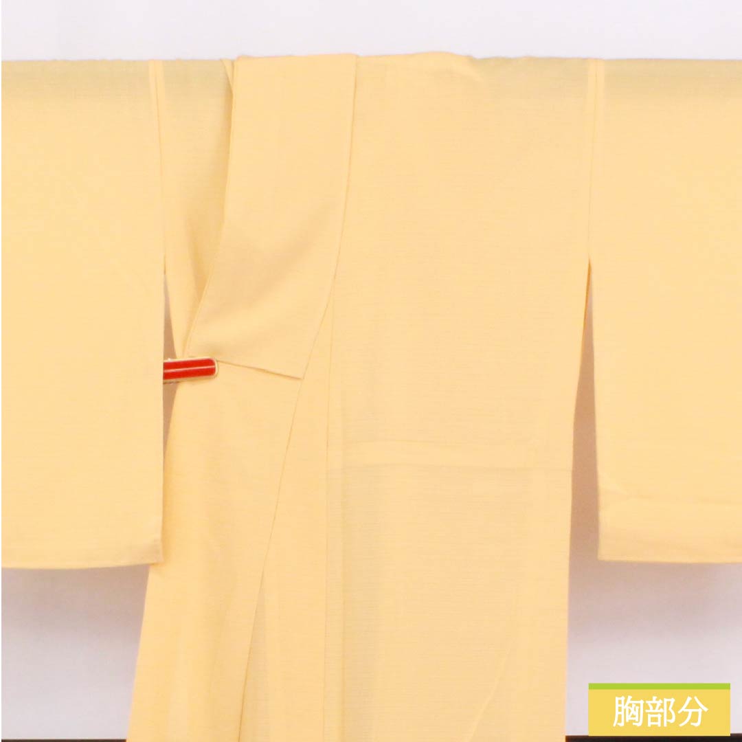 夏物 ポリエステル 色無地 Sランク 身丈171.5cm 裄丈70.5cm 薄柑子色(うすこうじいろ) 一つ紋 五三桐 絽ちりめん 絽 橙系 1132003062626