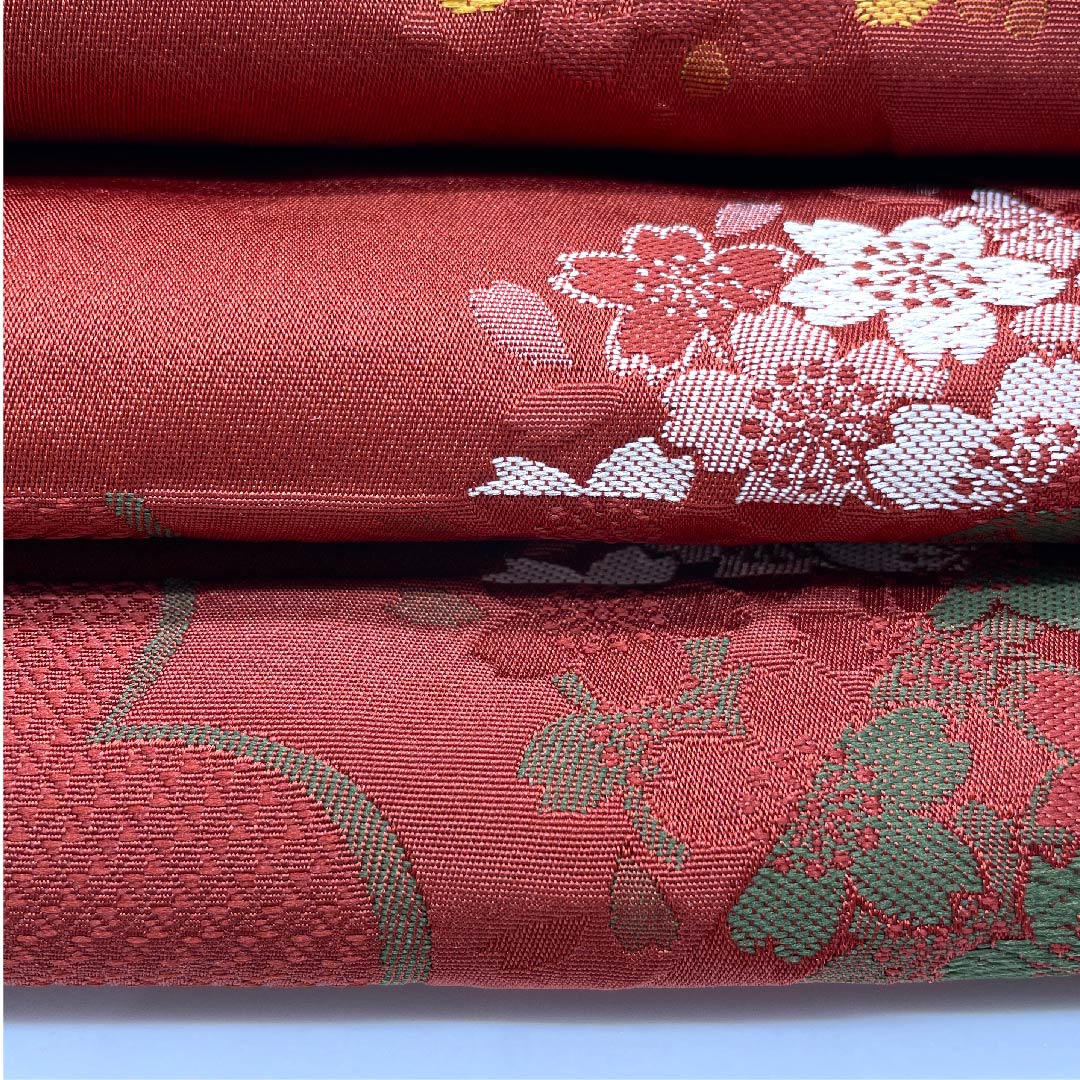 名古屋帯 京袋帯 生臙脂色 梅 桜 変わり市松 帯丈386.5cm ポリ Sランク 全通 セミフォーマル 朱系 1124003282316 開き仕立て