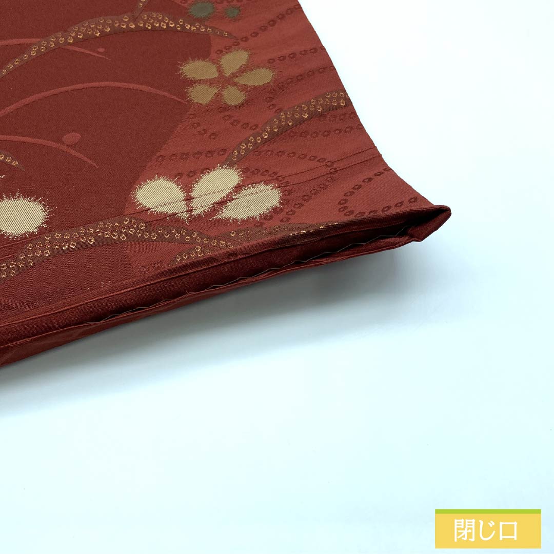 (京袋帯)名古屋帯 ポリエステル Aランク 赤銅色(しゃくどういろ) 京袋帯 露芝 花模様 帯丈364cm 六通 カジュアル 朱系 1124010653316 開き仕立て
