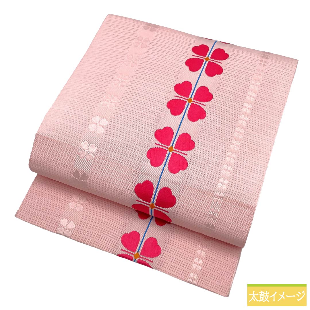 名古屋帯 ポリエステル Aランク 開き仕立て 曙色(あけぼのいろ) クローバー 夏帯 長尺 帯丈378cm 全通 カジュアル ピンク系 1124013233313