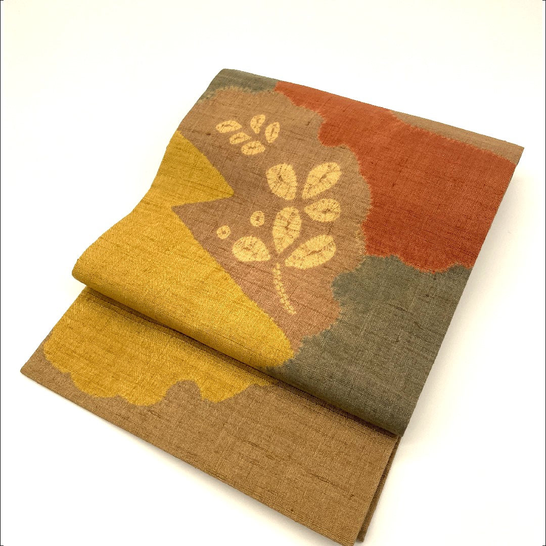 名古屋帯 生紬 雪輪 草葉模様 帯丈373cm 正絹 Sランク 六通 カジュアル 茶系 1124000322314 名古屋仕立て