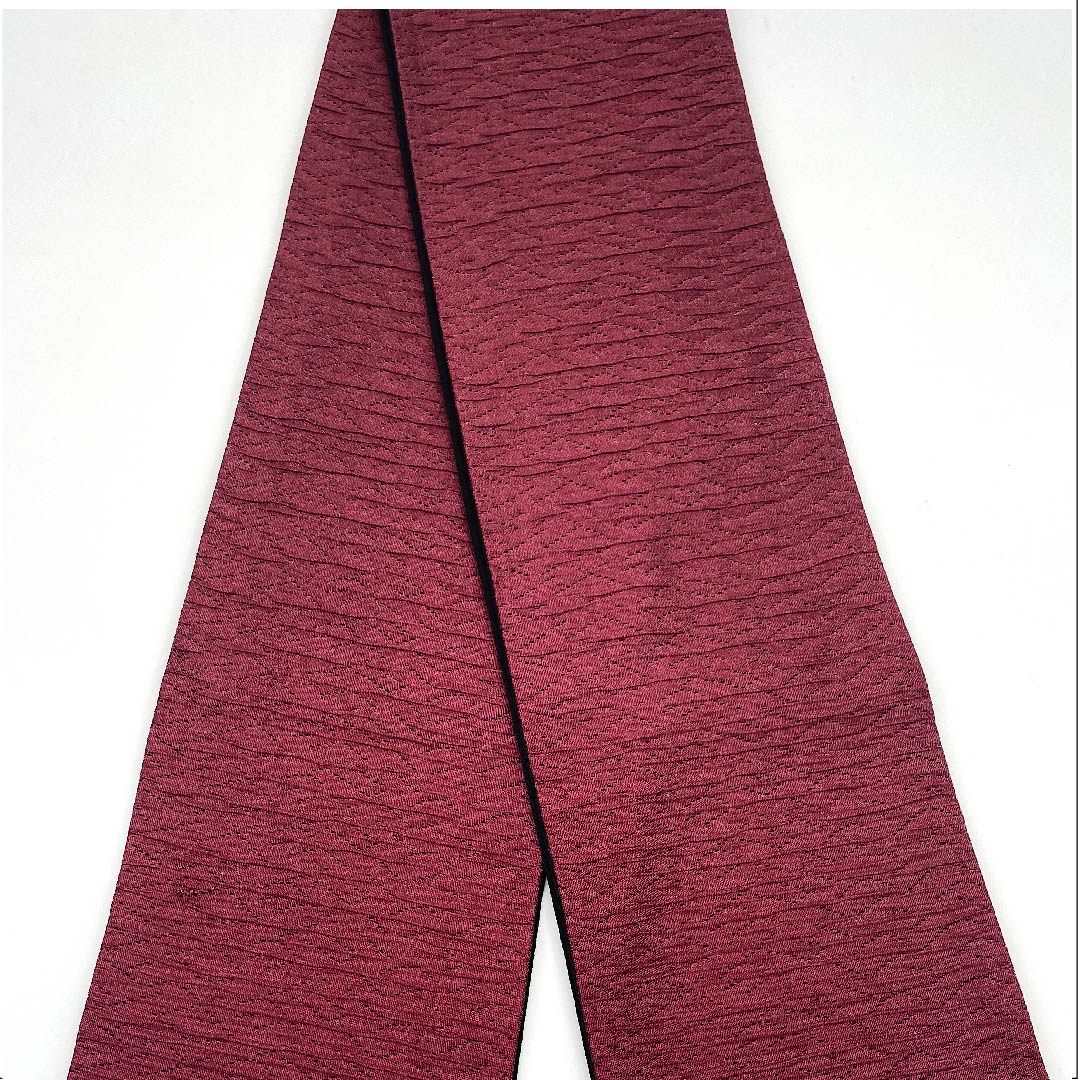 半幅帯 ポリエステル 胭脂紅色（えんじこういろ） ギザギザ模様 幾何学模様 帯丈362cm 紫系 Sランク 1125001222320