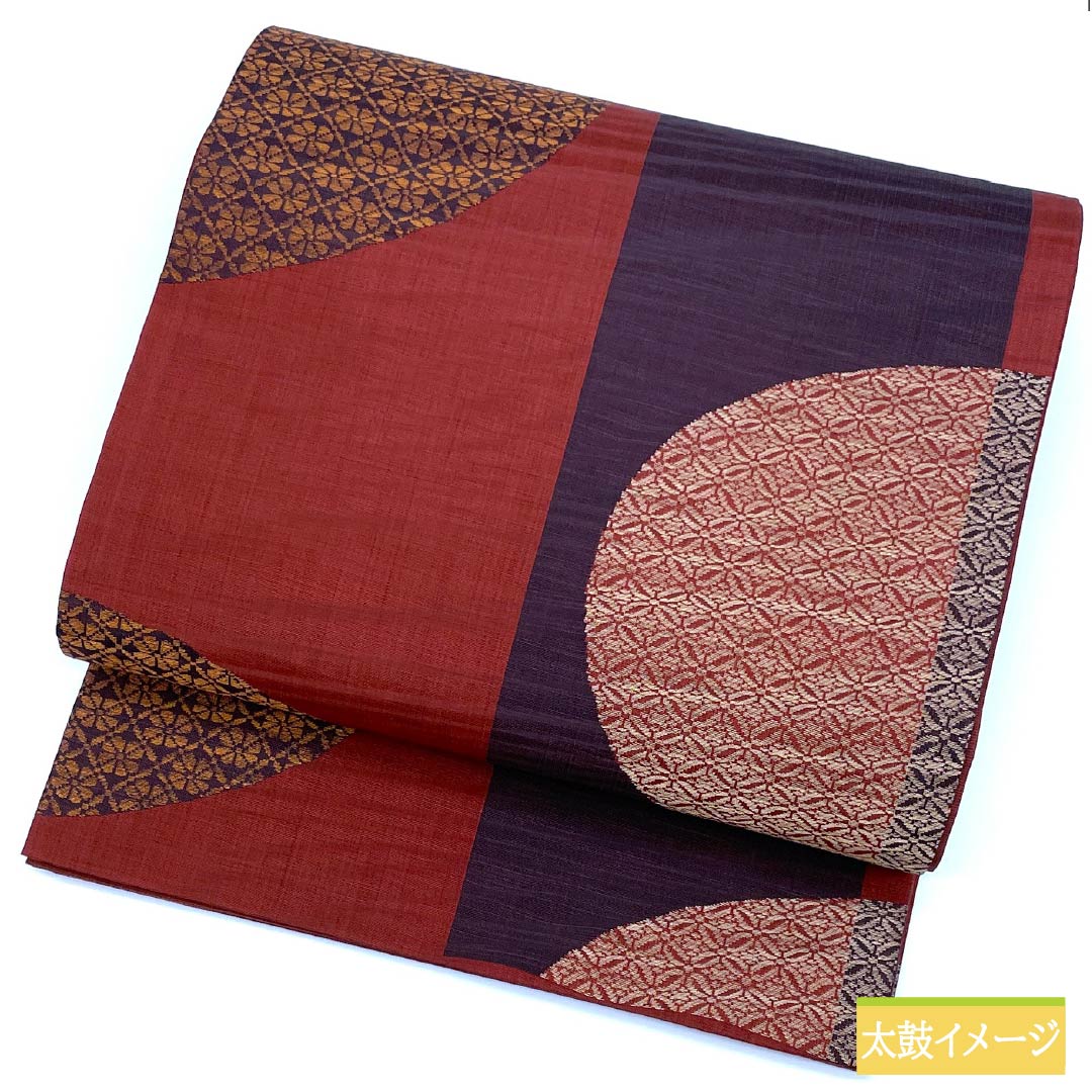 袋帯 正絹 生臙脂色（しょうえんじいろ）  紫烏色色（しうしょくいろ） 丸に七宝 丸に菊 帯丈436cm Sランク 六通 カジュアル 朱系 1123012502316