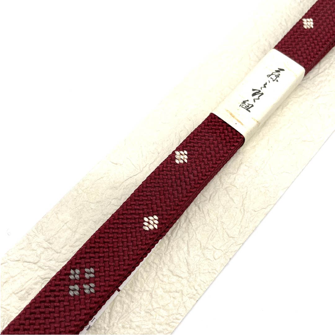 （新古品） 帯締め 正絹 四分紐 海老色（えびいろ） 四代藤三郎紐 小花模様 新古品 長さ約160cm 幅約1.5cm カジュアル Sランク 赤系 1135000102912