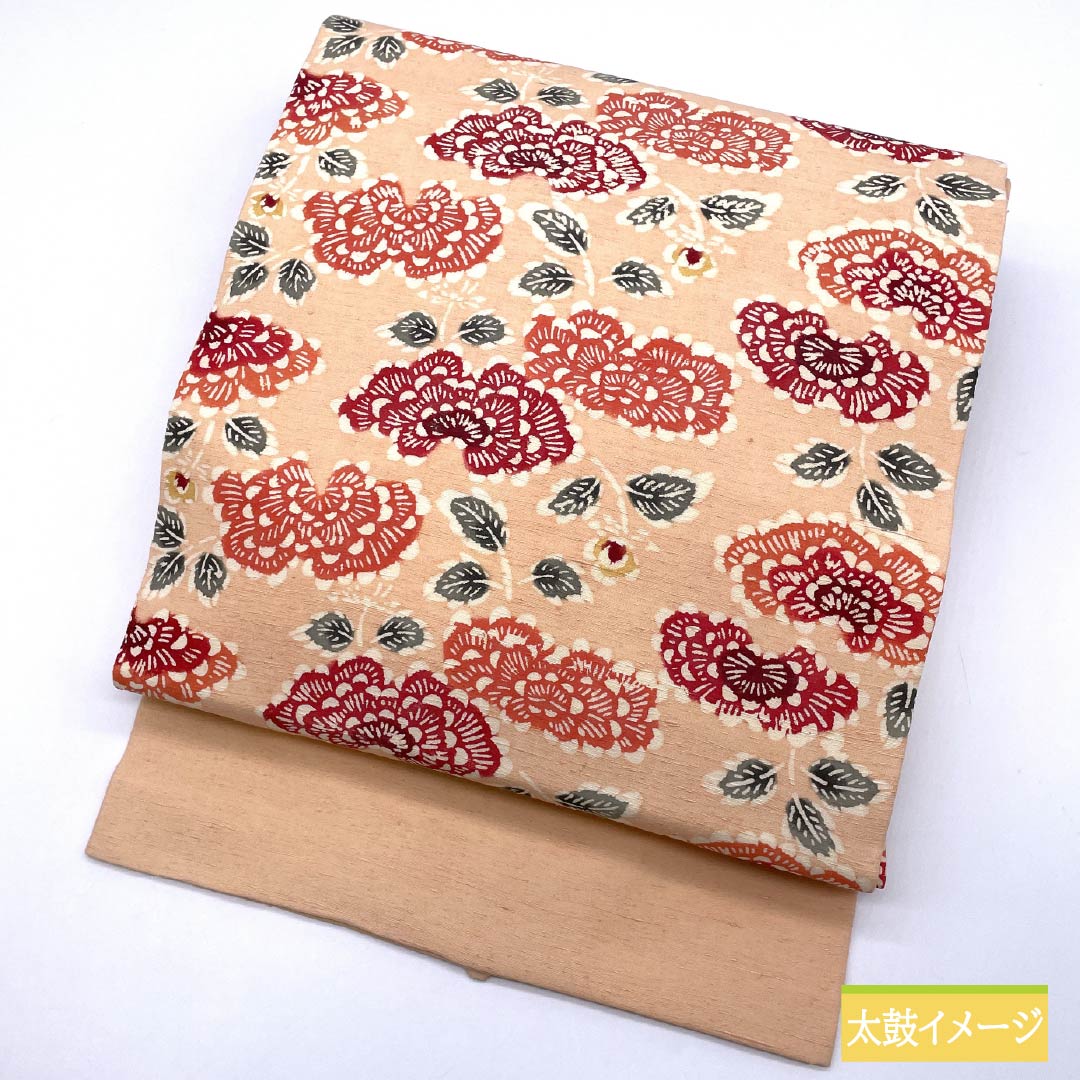 名古屋帯 サーモンピンク色 紬地 型染め 抽象花模様 帯丈358cm 正絹 Sランク 六通 カジュアル ピンク系 1124008272313 名古屋仕立て