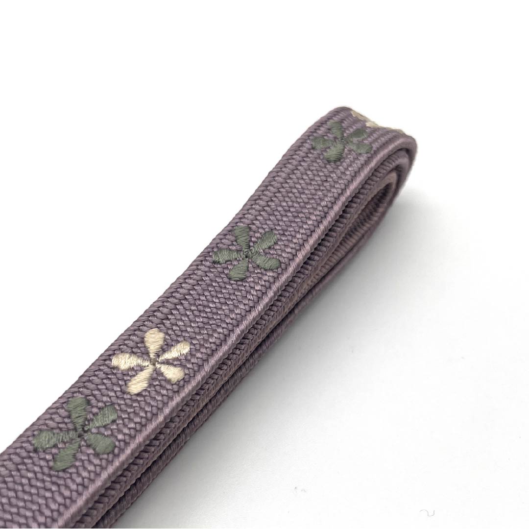 （新古品） 帯締め 正絹 四分紐 半色（はしたいろ） 花模様 新古品 長さ約159cm 幅約1.6cm セミフォーマル NEWランク 紫系 1135003021320