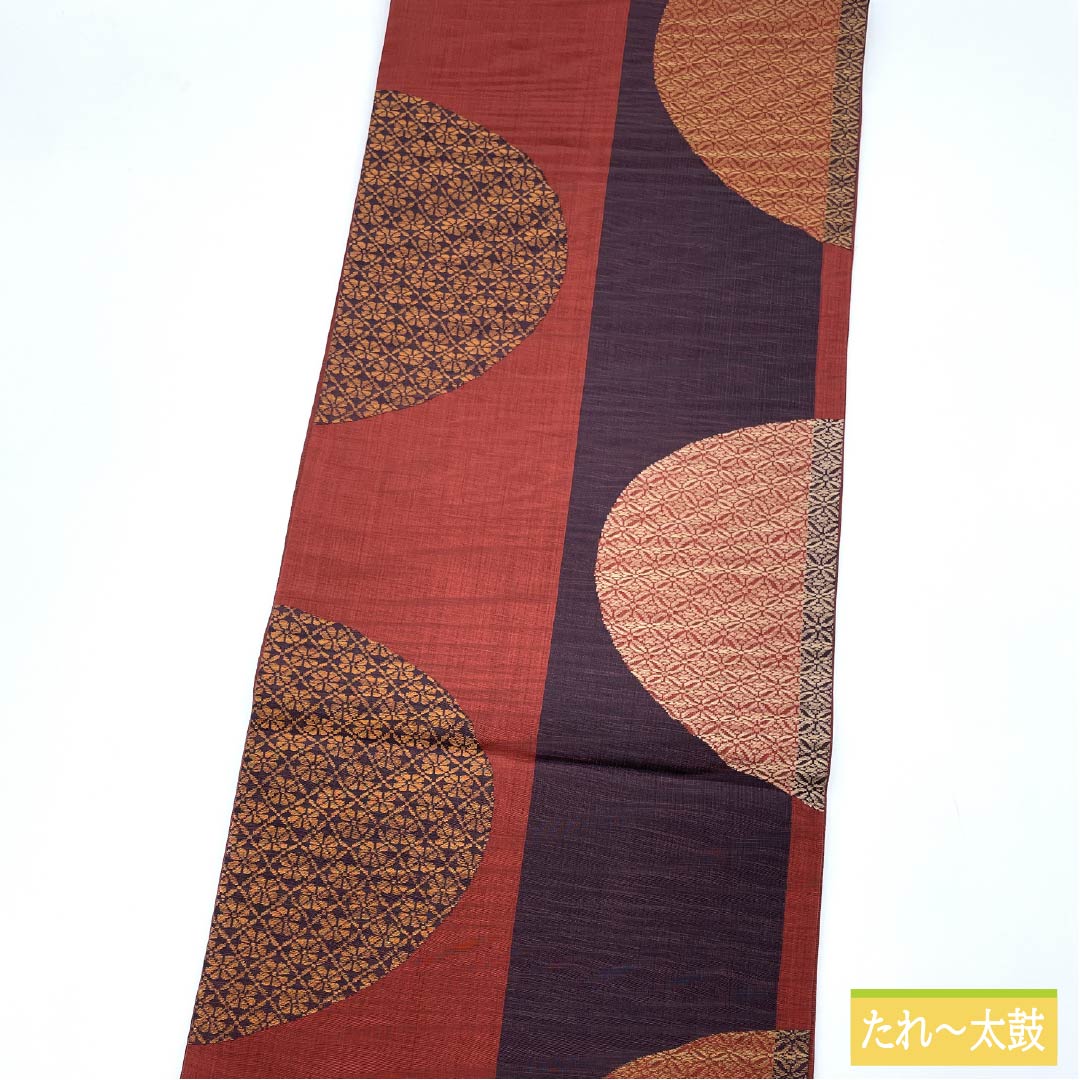 袋帯 正絹 生臙脂色（しょうえんじいろ）  紫烏色色（しうしょくいろ） 丸に七宝 丸に菊 帯丈436cm Sランク 六通 カジュアル 朱系 1123012502316