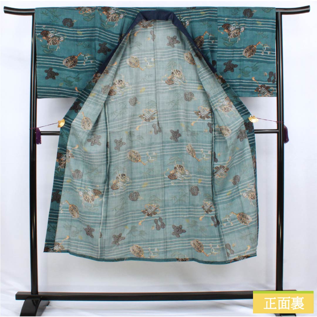 Men's wool nagajuban (long under-kimono), S-rank, length 138cm, sleeve length 65.5cm, indigo brown (aito-chairo) color, with a helmet, pine, and bamboo motifs, single-layer, blue-based design, product number 1140000742317
