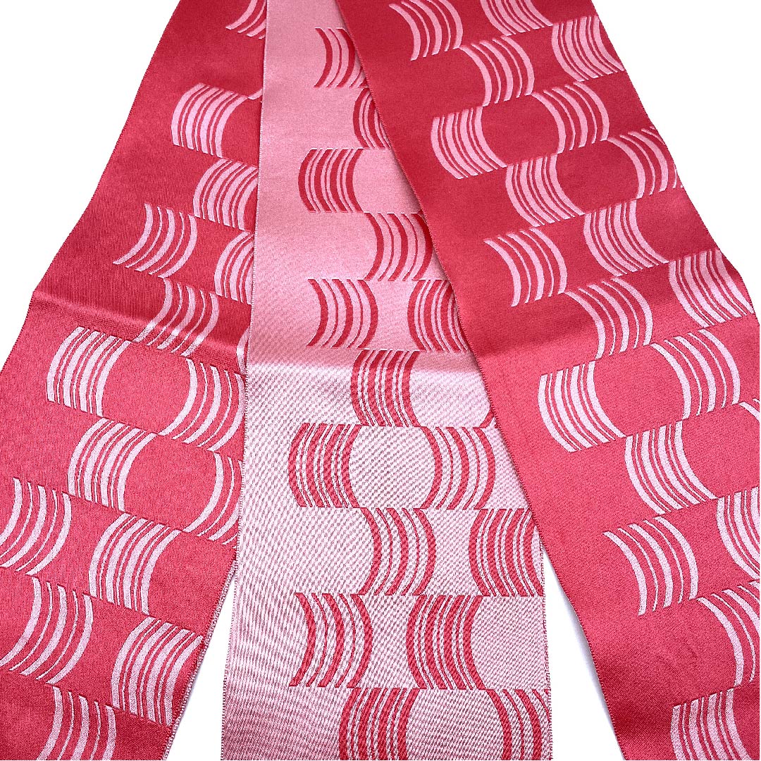 半幅帯 ポリエステル 帯丈356cm 火裏紅色（かりこういろ） 幾何学模様 曲線 ピンク系 Sランク 1125001362313