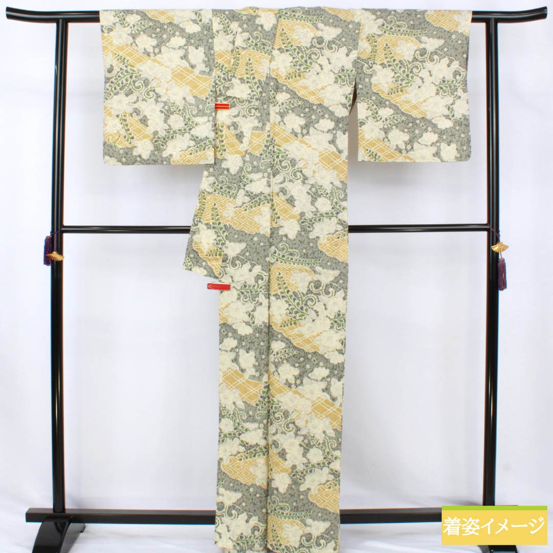 リサイクル着物】小紋 ポリエステル Sランク 身丈164cm 裄丈67cm 単衣