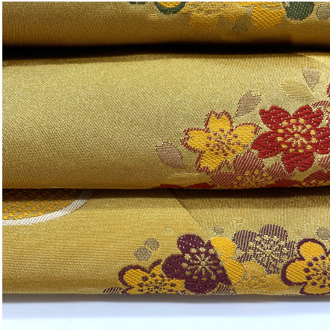 名古屋帯 京袋帯 梅谷渋色 桜 梅 変わり市松 帯丈392cm ポリ Aランク 全通 セミフォーマル 黄系 1124003353323  開き仕立て