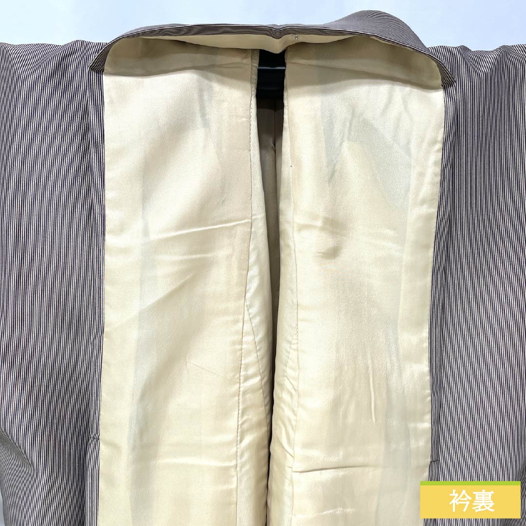 小紋 ポリエステル 身丈169cm 裄丈69.5cm 袷 落栗色（おちぐりいろ） 縦縞 未使用品 しつけ糸付き 洗える着物 Sランク 茶系 1115006002514