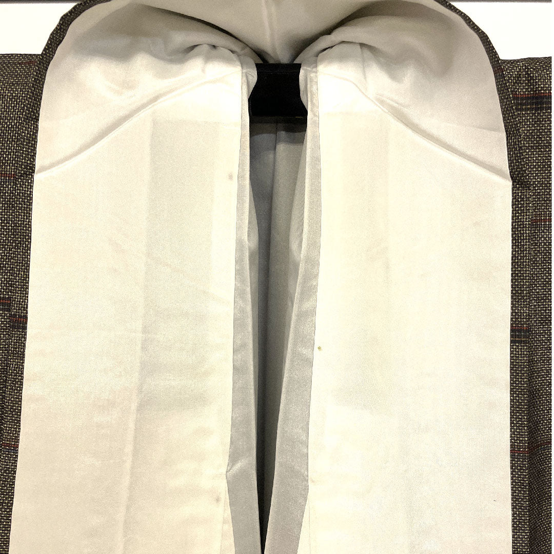 大島紬 身丈163cm 裄丈66cm 経緯絣 幾何学模様 正絹 Sランク 袷 茶系 1116001182414