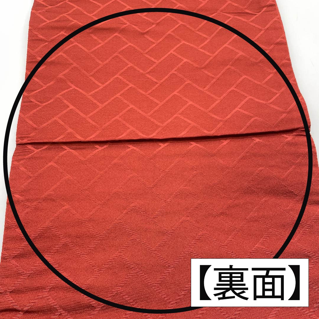 （京袋帯）名古屋帯 ポリエステル Aランク 赤銅色（しゃくどういろ） 京袋帯 露芝 花模様 帯丈364cm 六通 カジュアル 朱系 1124010653316 開き仕立て