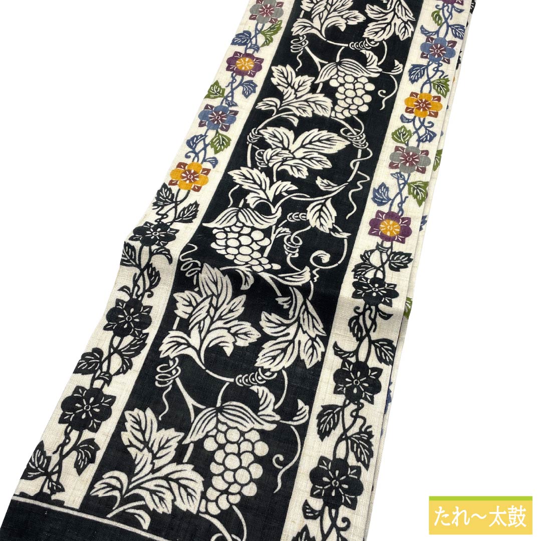 名古屋帯 麻 NEWランク 名古屋仕立て 黒色（くろいろ） 栗山吉三郎 京紅型 葡萄唐草 帯丈377cm ポイント柄 カジュアル 黒系 1124012391310