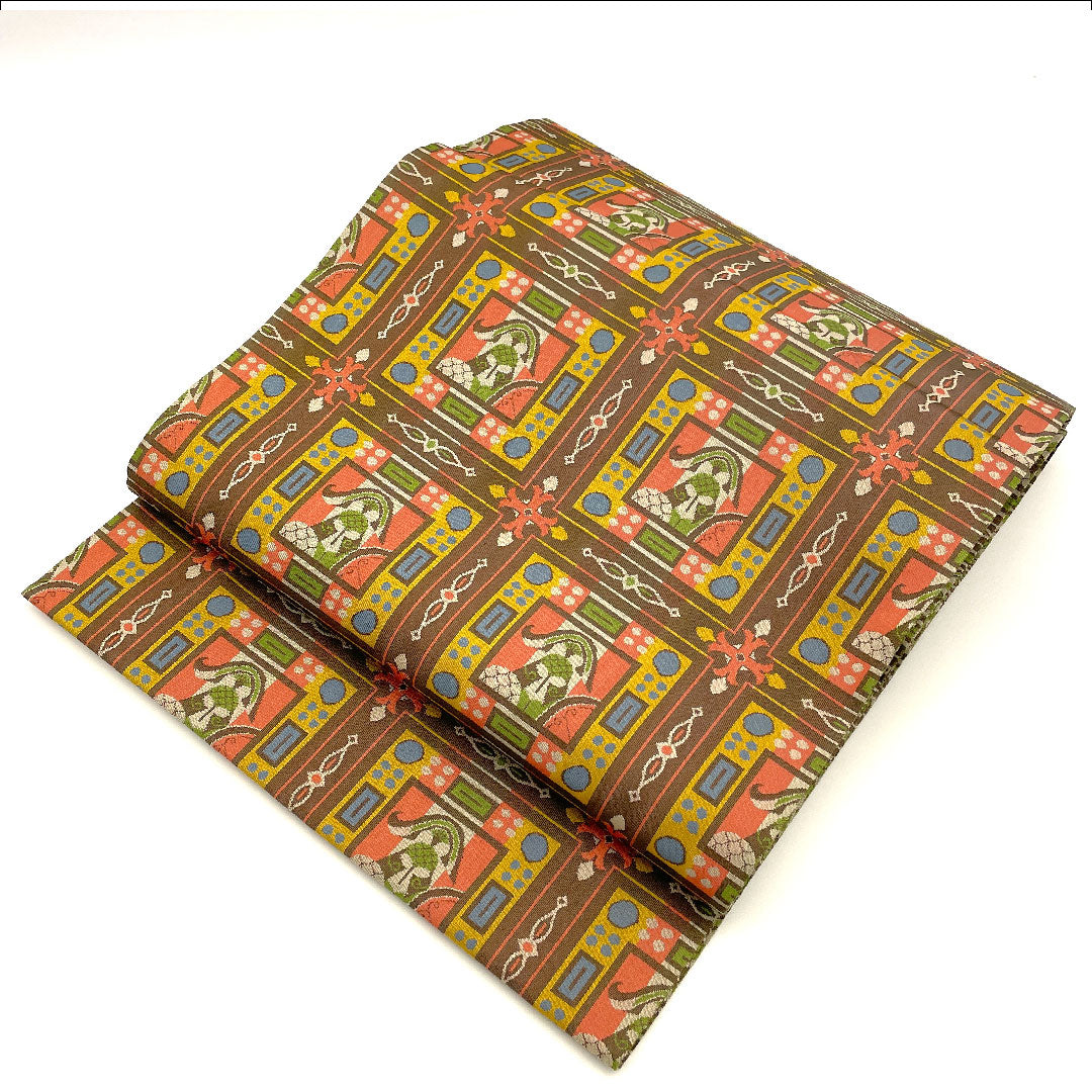 名古屋帯 龍村美術織物 コプト甲冑異文 帯丈352cm 正絹 Sランク 全通 カジュアル 茶系 1124001062314  開き仕立て